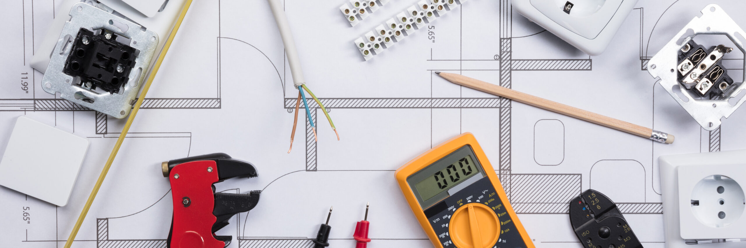Electrical Instrument With Tools On A Blueprint