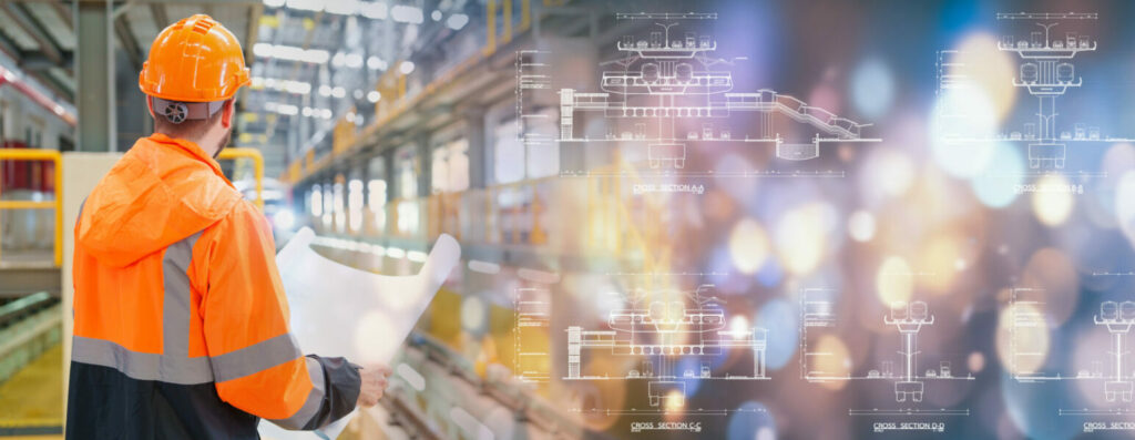Electrical engineer railway in the maintenance station using blueprint section electric train drawing checking construction process of sky electric train traffic important infrastructure in Thailand.